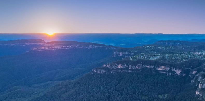 Flat hills at sunset