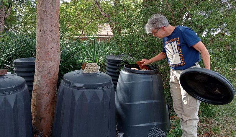 Clair checks the compost